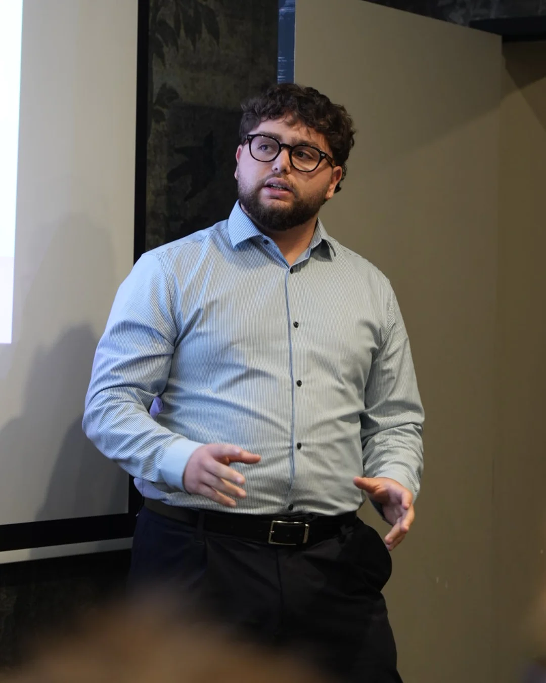 Mérouane Zins, co-founder of FZ Connect, speaking at a conference